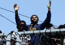 Accoglienza dei migranti, flash mob “Magliette Rosse” in piazza a Vicenza. L’appello di Libera e della Cgil