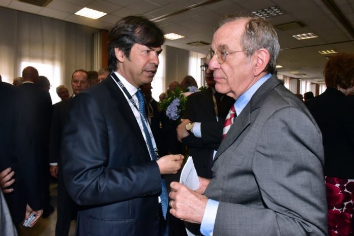 Carlo Messina (Intesa) e Carlo Padoan, stratega della cessione delle ex Popolari venete a Intesa Sanpaolo