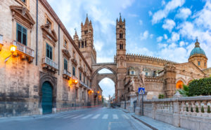 Palermo cathedral, connected with arcades to the Archbishops Palace in Palermo in the morning, Sicily, Italy