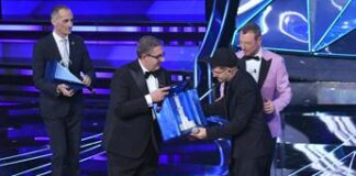 Geolier e i fischi a Sanremo, la difesa della coach: “Ha una voce da baritono incredibile”