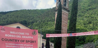 Giro sul Monte Grappa, venti comuni vicentini espongono i teli rosa per promuovere il territorio giro monte grappa