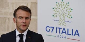 G7, gelo Meloni-Macron alla cena: lui fa il baciamano