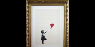 Rubano stampa ‘Ragazza con Palloncino’ di Banksy, incriminate 2 persone