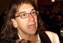 Sanremo, il ‘disturbatore’ Paolini irrompe al Tg1: “Conti bisex”. E lui risponde…