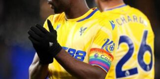 Premier, polemiche su Guehi: scrive “Io amo Gesù” sulla fascia arcobaleno