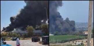 Fano, incendio nella zona industriale. Enorme nube di fumo nero