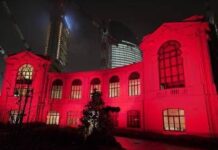 Violenza su donne, Fondazione Fiera Milano illumina di rosso sede Palazzina degli Orafi