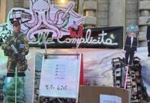 Scala, la protesta prima dell’evento: Meloni e ministri ritratti con l’elmetto