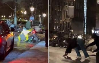 Amsterdam congelata: si scivola tra strade ghiacciate e scene surreali