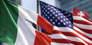 Tra alleanza e sovranità incrinate dagli USA e scivoloni istituzionali con la Svizzera: la confusione internazionale del governo italiano Governo italiano in confusione tra USA e Svizzera lacera la bandiera