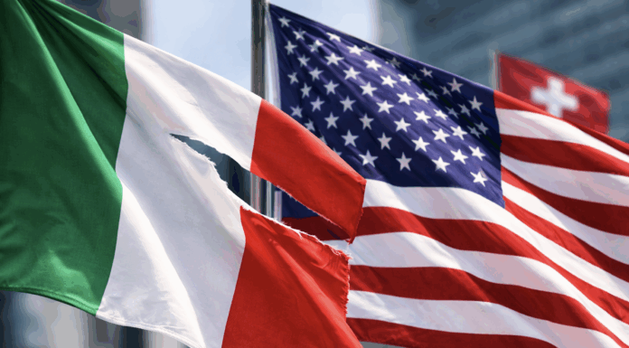 Tra alleanza e sovranità incrinate dagli USA e scivoloni istituzionali con la Svizzera: la confusione internazionale del governo italiano Governo italiano in confusione tra USA e Svizzera lacera la bandiera
