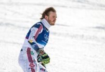 Milano Cortina, incubo McGrath: inforca e ‘butta’ l’oro nello slalom. Poi scavalca le recinzioni e si dispera nella neve