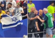 Tifoso sventola bandiera Israele, ct Egitto si infuria e se la prende con un fotografo