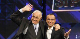 Baudo, Conti ricorda il grande conduttore: “Lui è la tv, indimenticabili i suoi abbracci paterni”