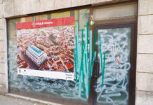 Vicenza. Vetrine sfitte e vetrofanie come toppa per nascondere il danno Uno dei tanti negozi sfitti a Vicenza