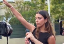 Saluto nazista davanti all’ambasciata del Marocco a Madrid, chi è l’attivista 24enne virale sui social