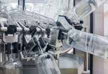 Acqua Dolomia apre lo stabilimento di Cimolais: il Veneto vale il 45% del fatturato Acqua Dolomia in Veneto, linea produttiva dello stabilimento di Cimolais