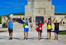 Trail degli Eroi, sold out anticipato per la gara regina da 46 chilometri sul Grappa Trail degli Eroi sold out, atleti davanti al Sacrario di Cima Grappa