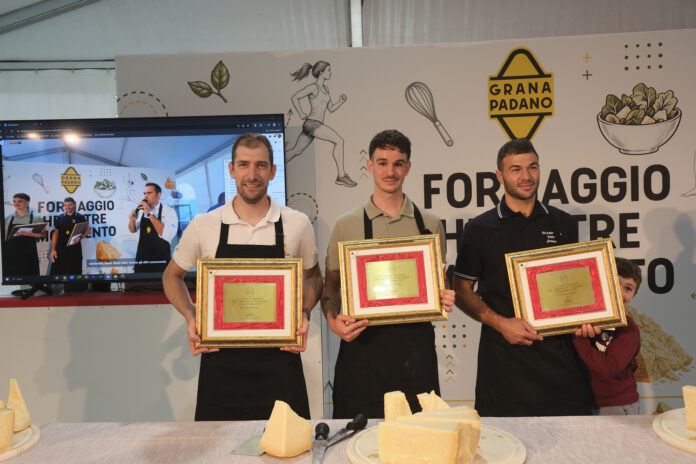 Caseus Italy 2026: Andrea Piva, Federico Benatello e Francesco Zonta sul podio del taglio del Grana Padano