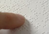 Testi in Braille dell’ULSS 8, Cunegato: «Il minor prezzo impoverisce il servizio» Testi in Braille dell’ULSS 8, dettaglio neutro di una pagina letta con le dita